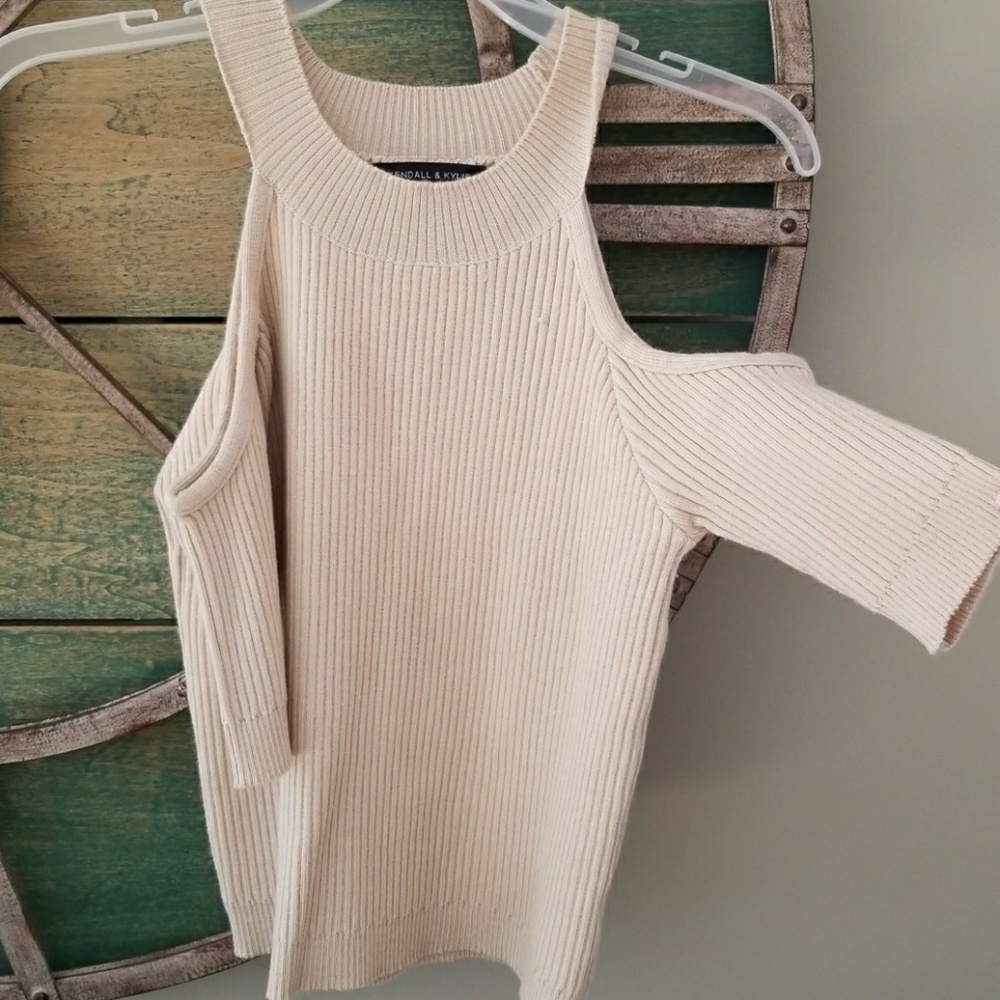 Cream colored cut shoulders